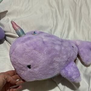 FAO Swartz purple norwal that plays a magical melody nwot and super cute